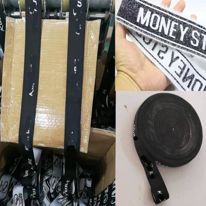 低いMOQは黒い伸縮性がある毛の頭部の覆いの輪ゴムのためのジャカード白いロゴをカスタマイズした